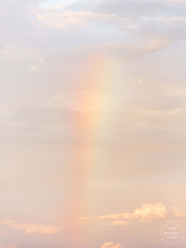 Little baby rainbow in a pastel sunset sky in Costa Rica. Photographed by Kristen M. Brown of Samba to the Sea for The Sunset Shop.