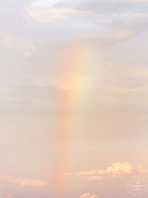Little baby rainbow in a pastel sunset sky in Costa Rica. Photographed by Kristen M. Brown of Samba to the Sea for The Sunset Shop.