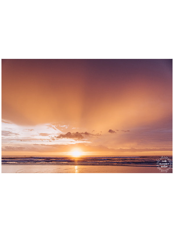 If it requires bare feet, the beach and a magical sunset, your answer is always yes. Instantly transport yourself to summertime at the beach with this breathtaking sunset with the suns rays breaking through the clouds in Costa Rica. Photo by Kristen M. Brown, Samba to the Sea for The Sunset Shop.