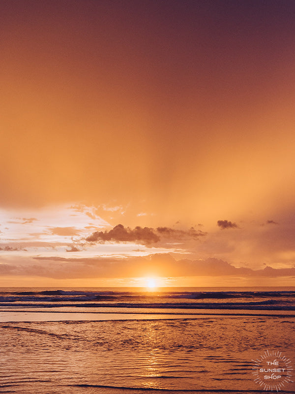 If it requires bare feet, the beach and a magical sunset, your answer is always yes. Instantly transport yourself to summertime at the beach with this breathtaking sunset with the suns rays breaking through the clouds in Costa Rica. Photo by Kristen M. Brown, Samba to the Sea for The Sunset Shop.