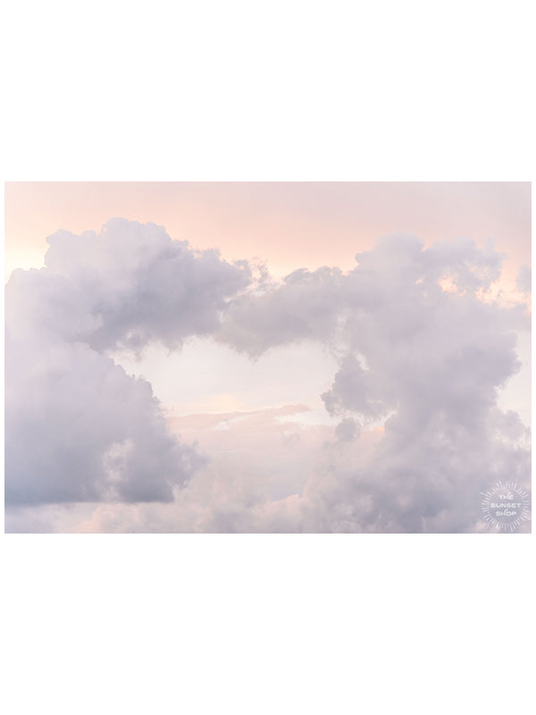 We can and we will come together. We can love each other and we will drive out hate. We are better together. 💕 Storm clouds making the shape of a heart during sunset in Savannah, GA. Photographed by Kristen M. Brown of Samba to the Sea for The Sunset Shop.