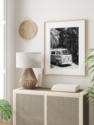 Vintage B&W VW Bus wall art in tropical neutral room. So what are you waiting for? Because there's nothing that says carefree summer beach days more than a VW Bus! Hop on in to the Biscayne Bus and let's roll down to the beach! Vintage VW Bus B&W tropical photo print "Biscayne Bus" photographed by Kristen M. Brown of Samba to the Sea for The Sunset Shop.
