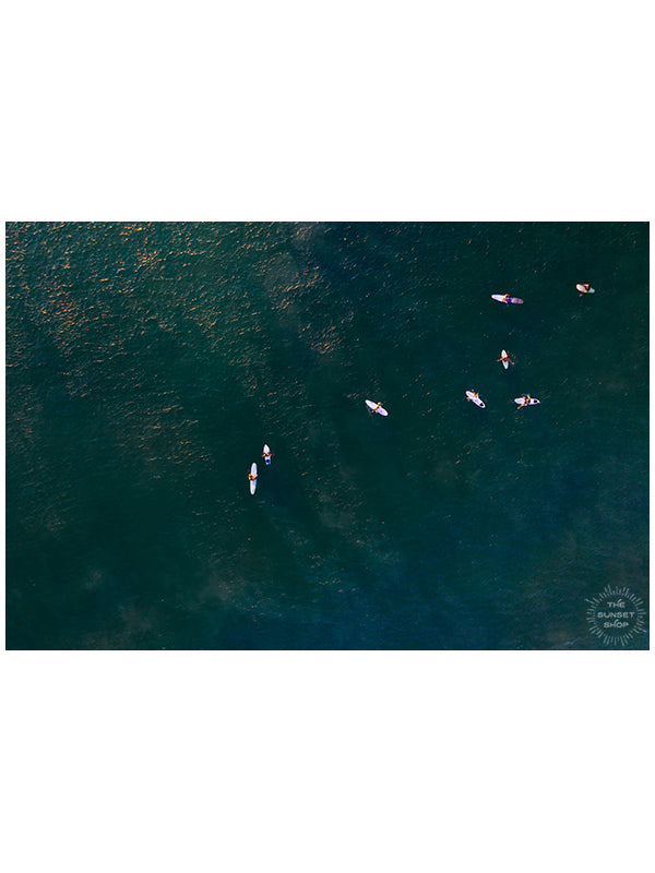 There&#39;s nothing quite like paddling out and sharing waves with your friends. Now that&#39;s your kind of board meeting! 🌊 Aerial image of surfers in ocean in Costa Rica by Samba to the Sea at The Sunset Shop.