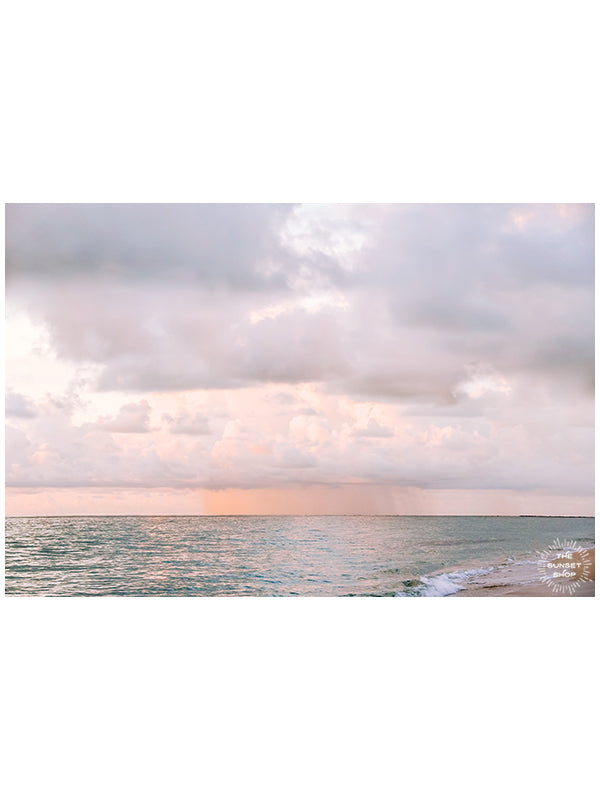 Pastel pink rain over Miami Beach during sunrise. Photo by Kristen M. Brown of Samba to the Sea.