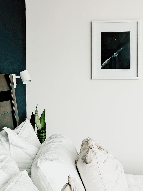 Surf shack vibes. Aerial surfer print by Samba to the Sea at The Sunset Shop. Image is an aerial photo of surfer dropping in on a wave in Tamarindo, Costa Rica.