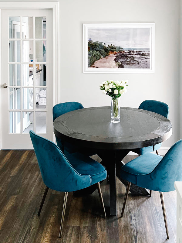 Costa Rica photography print hanging in breakfast nook in kitchen. Costa Rica beach photo captured by Kristen M. Brown of Samba to the Sea for The Sunset Shop.