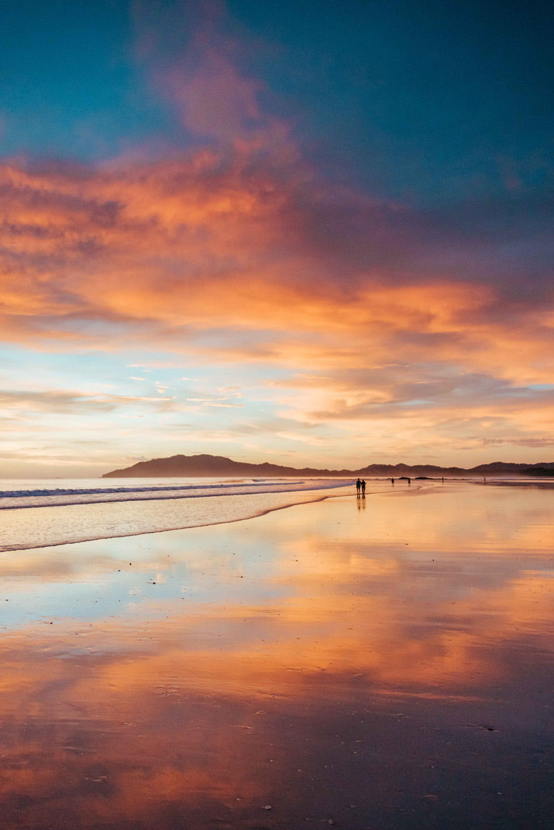 Magical golden orange beach sunset in Tamarindo Costa Rica.  Photographed by Kristen M. Brown, Samba to the Sea.