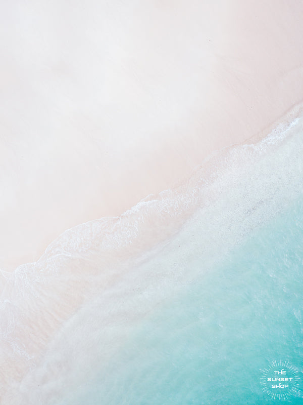 Aerial image of white sandy beach and turquoise ocean in Playa Conchal, Costa Rica. With the days merging together, the sun caressing your face, and the warm ocean touching your soul, you could be in Costa Rica, Hawaii, St. Barths, or around the world in Fiji. It doesn&#39;t matter, it&#39;s your paradise. Photographed by Kristen M. Brown, Samba to the Sea for The Sunset Shop.