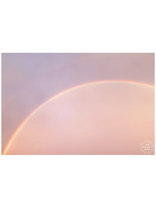 Be here now, right in this magical moment. Because life is too beautiful to not take a moment to revel in the magical beauty that surrounds us, like this vibrant rainbow painting the sunset sky as lightning cracks. Photo by Kristen M. Brown of Samba to the Sea.