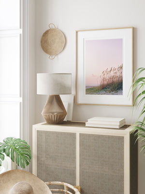 White beachy living room with Tybee Beach pastel sunrise beach dunes photography print. Tybee Island beach photography prints by Kristen M. Brown of Samba to the Sea for The Sunset Shop.