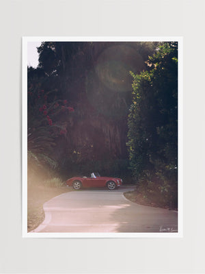 You that top down, wind in your hair, late afternoon sun kissing your face feeling? Yeah, that feeling of carefree days -- it's a feeling like no other. Especially when you're rolling in a gorgeous Austin Healey in a vibrant shade of red that purrs like no other. "Furia Roja - Red Fury" classic sports car photo print by Kristen M. Brown of Samba to the Sea for The Sunset Shop.