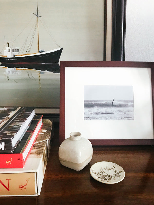 Black and white photo print of surfer hanging five surfing in Tamarindo Costa Rica. Nautical home decor with  sailboat painting. "Hang Five" available at The Sunset Shop by Kristen M. Brown of Samba to the Sea. 