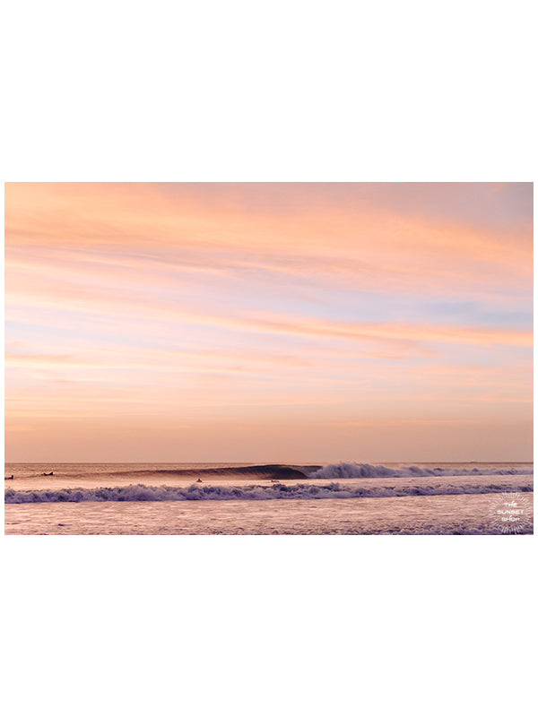 Rose gold sunset waves breaking in Costa Rica. Hola Ola! sunset wave print by Samba to the Sea at The Sunset Shop. Image of breaking waves during a beautiful sunset in Costa Rica. 