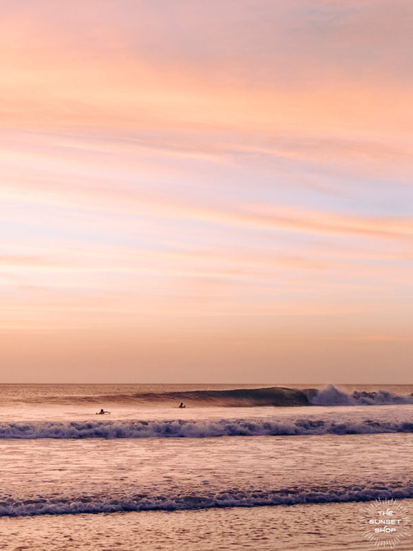 Rose gold sunset waves breaking in Costa Rica. Hola Ola! sunset wave print by Samba to the Sea at The Sunset Shop. Image of breaking waves during a beautiful sunset in Costa Rica. 