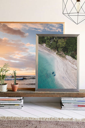 Tamarindo Costa Rica estuary. Aerial image of turquoise water, white sand beach, boats, and palm trees. Aerial beach print by Samba to the Sea at The Sunset Shop.