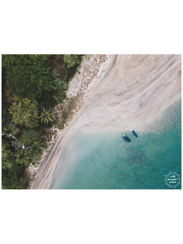 Tamarindo Costa Rica estuary. Aerial image of turquoise water, white sand beach, boats, and palm trees. Aerial beach print by Samba to the Sea at The Sunset Shop.
