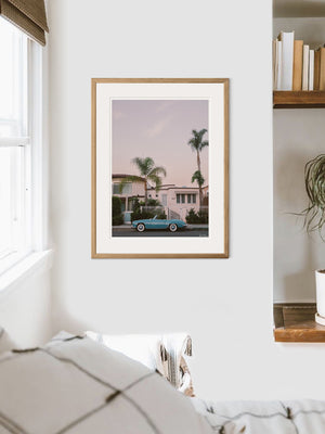 Vintage Mercedes Benz convertible photography print hanging in bedroom. "Laguna Beach Blue Benz" Mercedes Benz 300SL photo print by Kristen M. Brown of Samba to the Sea for The Sunset Shop.