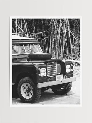 Tucked away in between volcanoes, there lies a magical cloud forest called Monteverde in Costa Rica with a vintage Land Rover series 3 awaiting your arrival. Welcome back to your adventure daydream, all from the comfort of your home...wherever home may be with "Landy Three". Black and white photo print of Land Rover Series 3 by Kristen M. Brown of Samba to the Sea for The Sunset Shop.