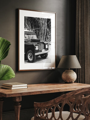 Vintage Land Rover black and white photo print for your home office. Welcome back to your adventure daydream, all from the comfort of your home...wherever home may be with "Landy Three". Black and white photo print of Land Rover Series 3 by Kristen M. Brown of Samba to the Sea for The Sunset Shop.
