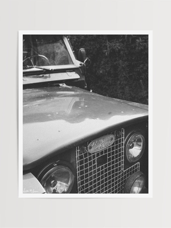 Tucked away in between volcanoes, there lies a magical cloud forest called Monteverde in Costa Rica with a vintage Land Rover Series Two awaiting your arrival. Welcome back to your adventure daydream, all from the comfort of your home...wherever home may be with "Landy Two". Black and white photo print of Land Rover Series 2 by Kristen M. Brown of Samba to the Sea for The Sunset Shop.