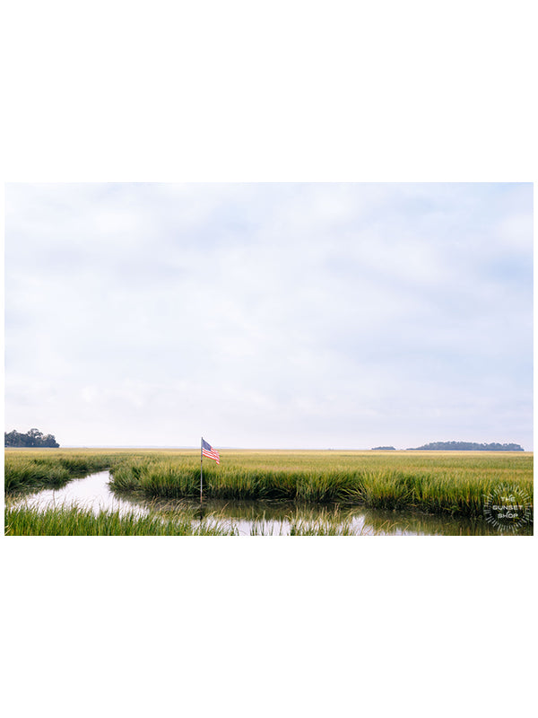 There's just something so soul filling wandering through the marsh in the early morning as the fog clears,, especially when you turn a bend and see the beautiful American Flag dancing in the wind.  Come explore the magic of the low country in Savannah, GA! "Lowcountry Liberty" photographed by Kristen M. Brown of Samba to the Sea.