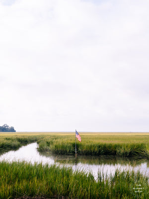 There's just something so soul filling wandering through the marsh in the early morning as the fog clears,, especially when you turn a bend and see the beautiful American Flag dancing in the wind.  Come explore the magic of the low country in Savannah, GA! "Lowcountry Liberty" photographed by Kristen M. Brown of Samba to the Sea.
