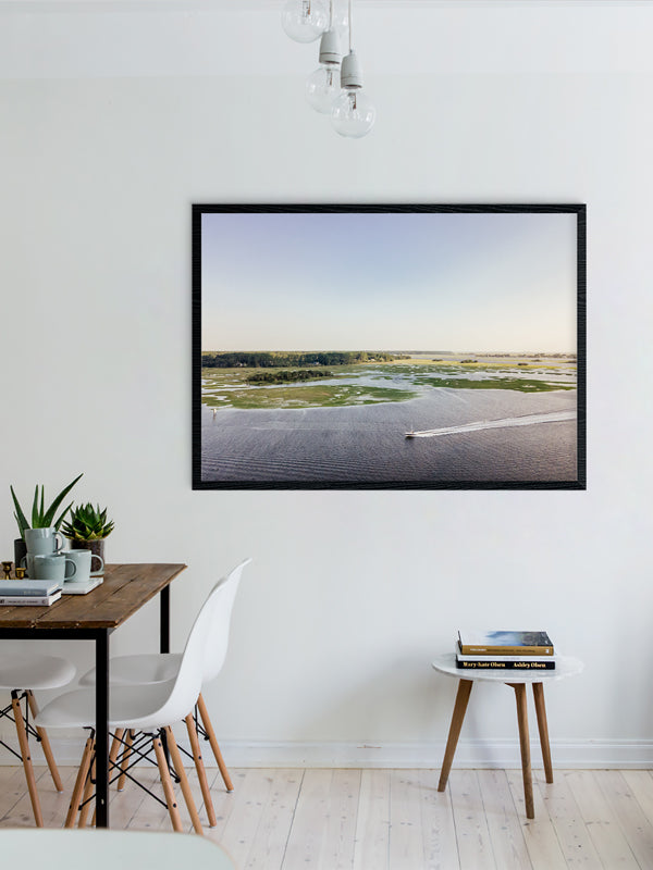 Coastal print "Lowcountry Living". Boat cruising down the river in Savannah, Georgia on Skidaway Island. Photographed by Kristen M. Brown, Samba to the Sea.