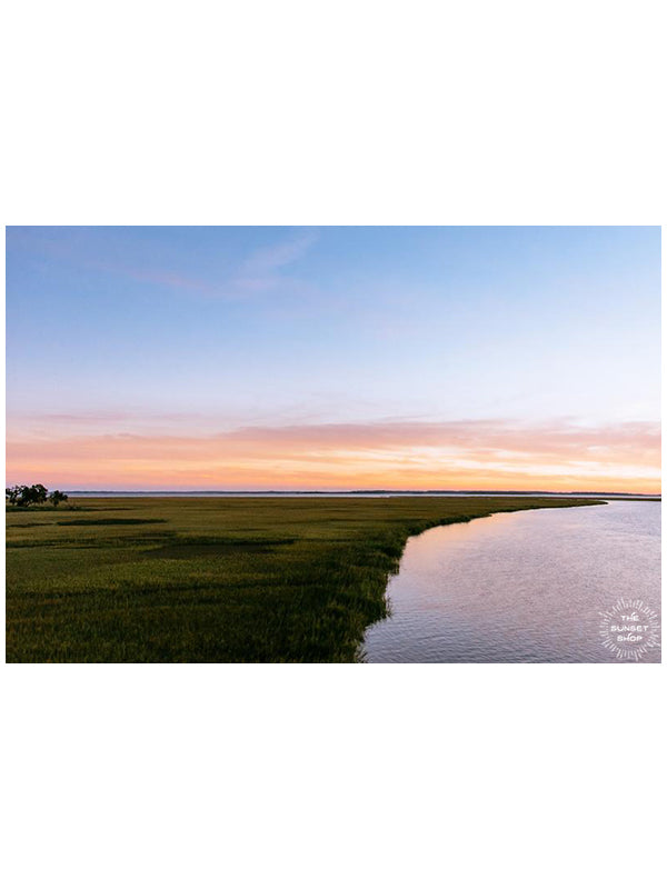 Magical pastel sunset over the marsh at Delegal Marina in Savannah, Georgia. Photographed by Kristen M. Brown, Samba to the Sea.