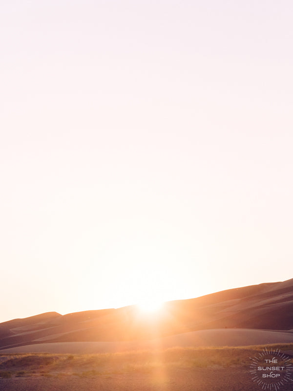 Whatever path you are on at this moment in life, whether it be paved, bumpy, the yellow brick road, or 1,000 feet straight up on loose sand at The Great Sand Dunes, always remember that the beauty in life also happens during the journey. Live it with soul, passion, love, and joy, always + always!  Pastel Sunset over The Great Sand Dunes in Colorado. "Meraki" photographed by Kristen M. Brown of Samba to the Sea for The Sunset Shop.