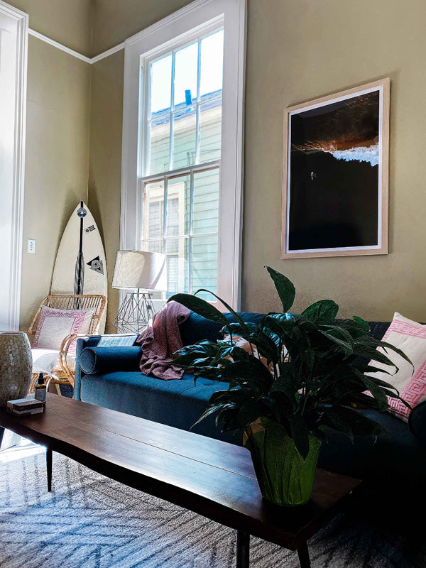 Surf Shack bohemian home in New Orleans. Aerial surfer print by Samba to the Sea at The Sunset Shop. Image is an aerial photo of surfer paddling out to surf in Tamarindo, Costa Rica. Print by Kristen M. Brown of Samba to the Sea for The Sunset Shop.