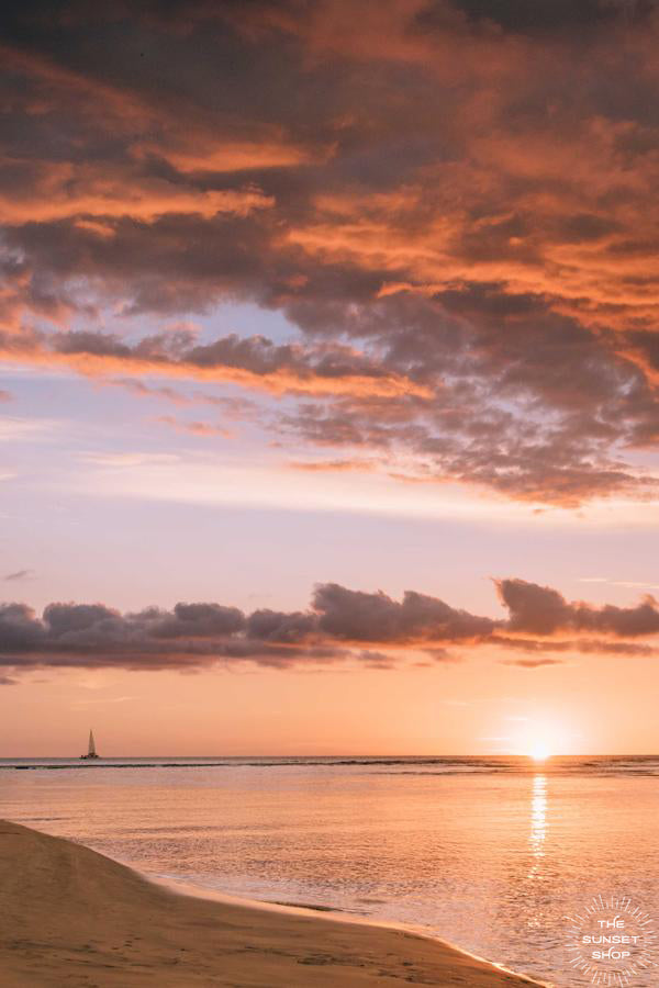 Sunset sky in Costa Rica with sailboat sailing on the horizon. "Rhiannon" sunset print by Samba to the Sea at The Sunset Shop. 