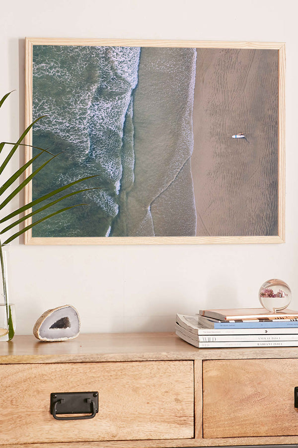 Aerial image of surfer on the beach in Nosara Costa Rica. Salt & Water aerial beach print photographed by Samba to the Sea for The Sunset Shop.