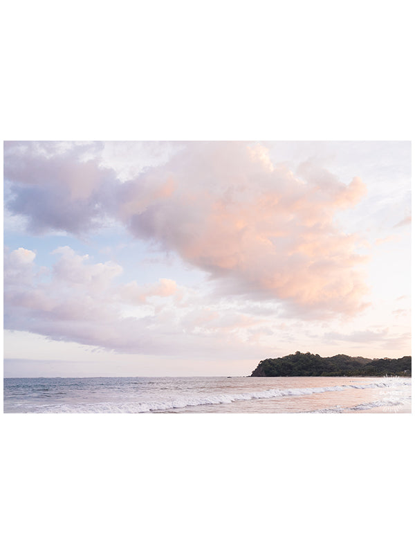 Serene sunset pastel pink sunset sky over the Pacific Ocean in Samara Costa Rica. "Sherbet Dreams" photographed by Kristen M. Brown, Samba to the Sea at The Sunset Shop.