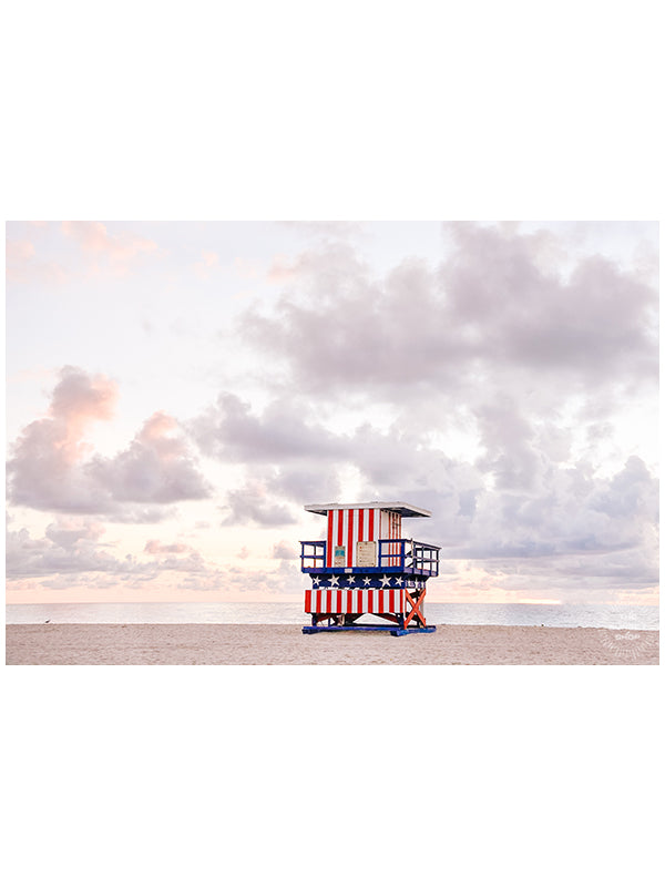 Pastel sunrise over South Beach in Miami with Stars and Stripes lifeguard tower. Photographed by Kristen M. Brown of Samba to the Sea for The Sunset Shop.