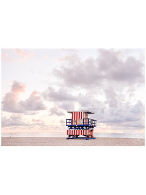 Pastel sunrise over South Beach in Miami with Stars and Stripes lifeguard tower. Photographed by Kristen M. Brown of Samba to the Sea for The Sunset Shop.