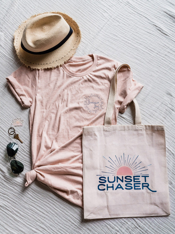 Ahhhhh, that feeling of summer. A beautiful day at the beach -- gentle waves, warm sand, and chasing the sunset. The never ending days and the smell of BBQs. There's nothing quite like the blissful summer feeling..and now you can show your love for summer with this super comfy, relaxed fit Summer Soul tee! Available at The Sunset Shop by Kristen M. Brown, Samba to the Sea.