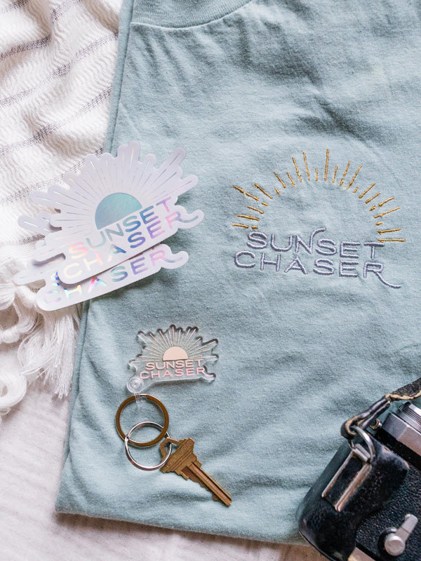 Do you love to chase sunsets? Is sunset your favorite color? Then this Sunset Chaser Club ombre acrylic keychain + holographic sticker have your name on it! By Samba to the Sea at The Sunset Shop.