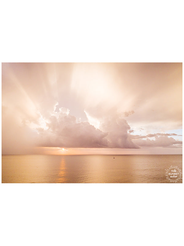 If it requires bare feet, the beach and a magical sunset, your answer is always yes. Instantly transport yourself to summertime at the beach with this breathtaking sunset with the suns rays breaking through the clouds in Costa Rica. Photo by Kristen M. Brown, Samba to the Sea for The Sunset Shop.