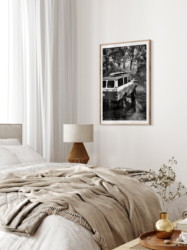 Over a river and down a dirt back road dirt lies a dreamy, peeling wave that only you and your surf amigos know about. You hear a new swell is on the way, so you message your friends to meet you at your secret spot, hop in your vintage Land Cruiser series 55, and surf the day away with just your surf amigos. Welcome back to your surf dream, all from the comfort of your home with black and white photo print “Surf Cruiser". By Kristen M. Brown of Samba to the Sea @ The Sunset Shop.