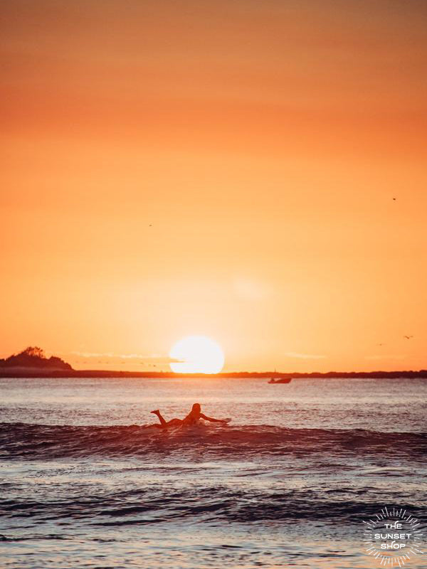 There's nothing better than ending your day with a surf and a beautiful sunset in Costa Rica. Surfer print by Samba to the Sea at The Sunset Shop. 