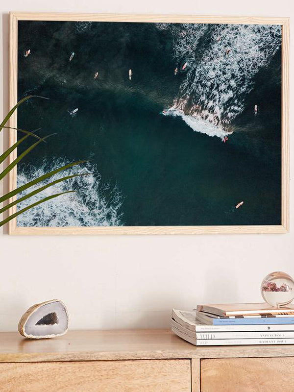 You Go Left and I'll Go Right aerial surfer print by Samba to the Sea at The Sunset Shop. Image is an aerial photo of surfer's splitting the peak in Tamarindo, Costa Rica.