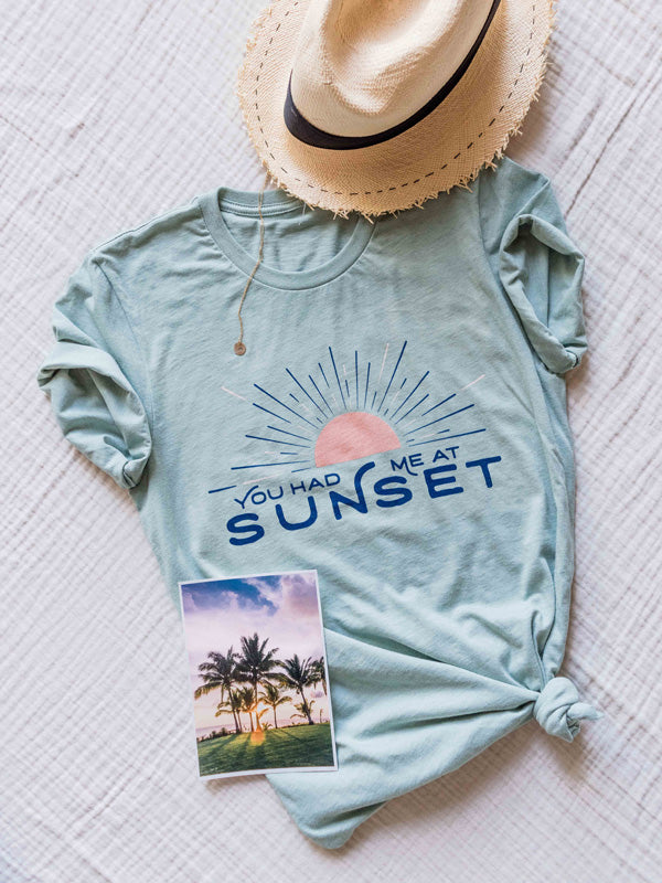 "What's your favorite color?" he asked  "Sunset." she replied.  There's nothing like ending the day watching the sun pass over horizon, painting the sky in magical colors...and now you can show your love for all things sunset with this super comfy, relaxed fit graphic tee "You Had Me At Sunset"! By Samba to the Sea at The Sunset Shop.
